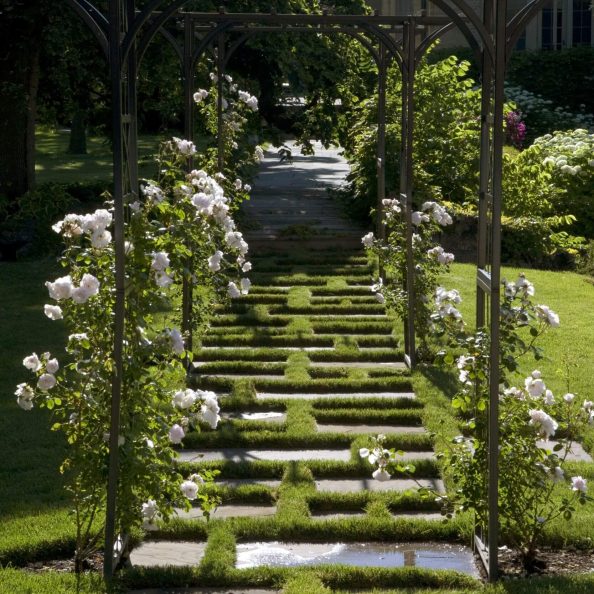 Flower arch and paver pathway